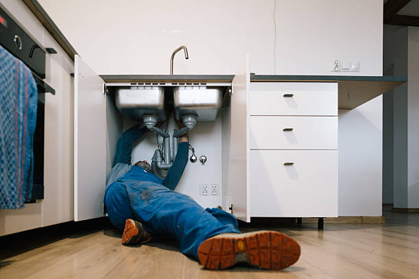 Professional Drain Cleaning technician working in Metuchen, NJ